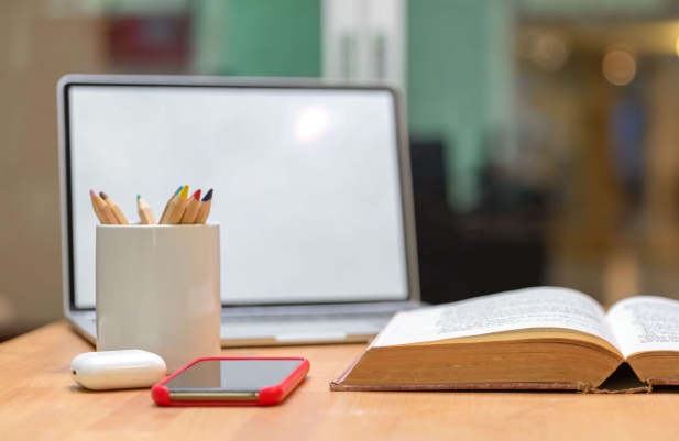 a book and a phone on a table